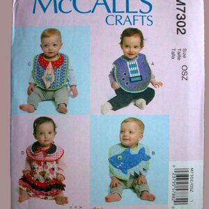 McCall's Patterns M7302 Infant Bibs with Applique